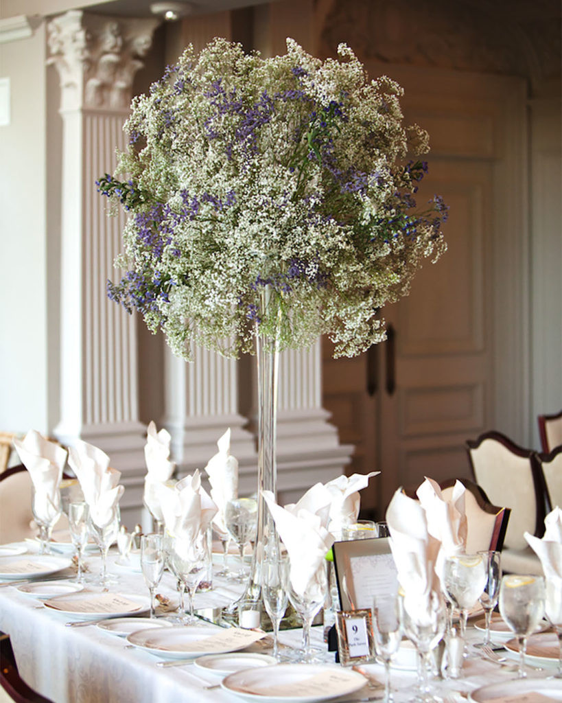 Elegant wedding tablescape with tall babys breath floral arrangements at the Park Savoy in Florham Park NJ by Laura Billingham Photography
