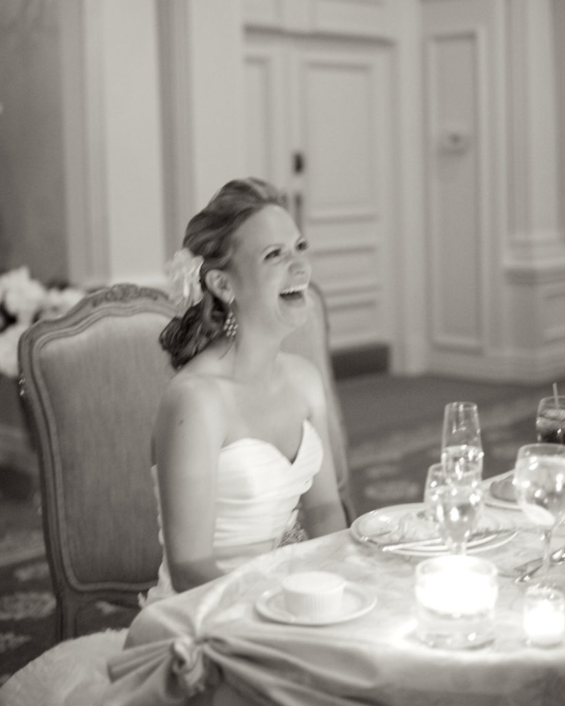 Elegant bride laughing during her wedding at the Park Savoy in Florham Park NJ by Laura Billingham Photography