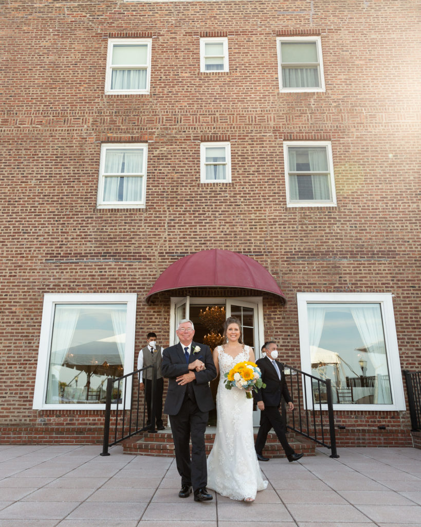 Father of the bride and bride entrance at the Molly Pitcher Inn in Red Bank, NJ photographed by Laura Billingham