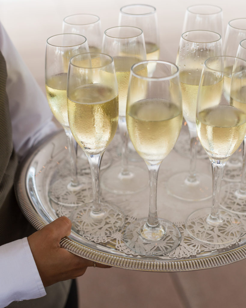 Tray of champagne awaits wedding reception guests at the Molly Pitcher Inn in Red Bank, NJ photographed by Laura Billingham