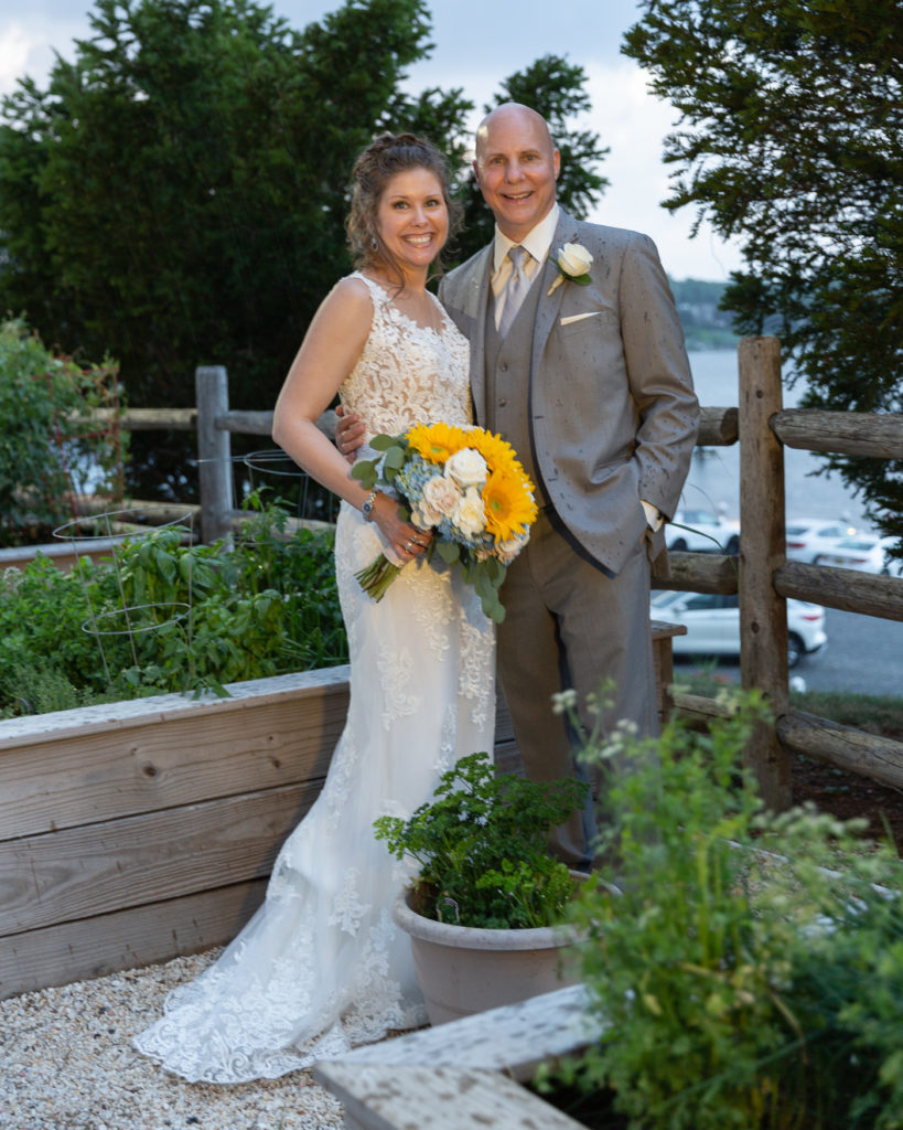 Elegant bridal portrait in front of the Molly Pitcher Inn in Red Bank, NJ by wedding photographer Laura Billingham