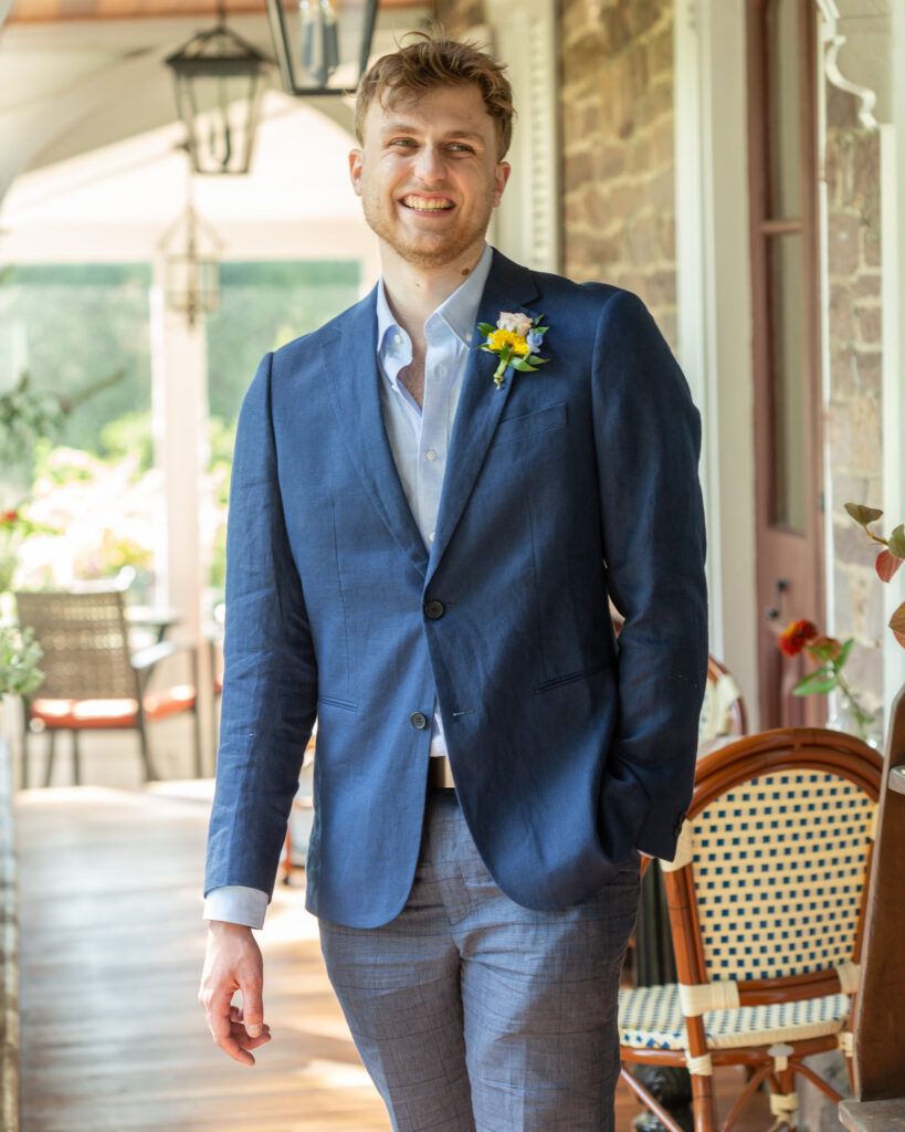 happy groom at the Woolverton Inn, Stockton, NJ photographed by Laura Billingham