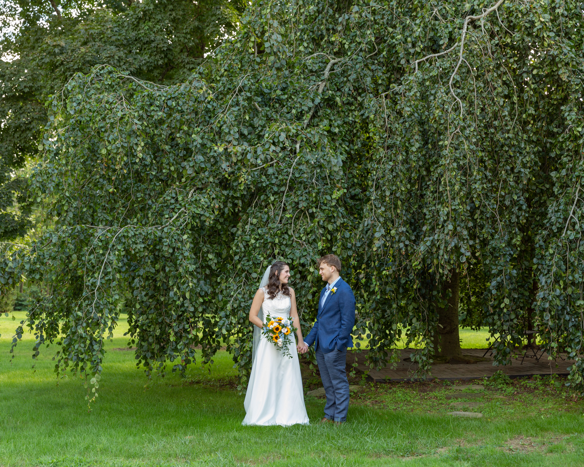 Classic bride and groom portrait at the Woolverton Inn in Stockton, NJ by wedding photographer Laura Billingham