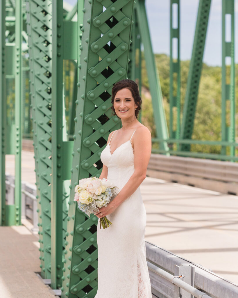 Portrait of an elegant bride on the Milford, NJ bridge over the Delaware River near Bridgeton House on the Delaware by Laura Billingham Photography