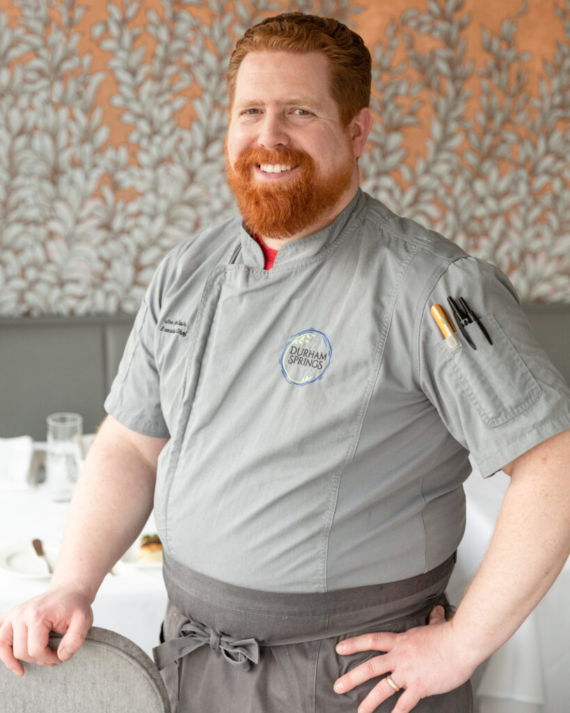 Portrait of Chef Jon McCain at Cascade restaurant at Durham Springs for River Towns Magazine photographed by Laura Billingham Photography