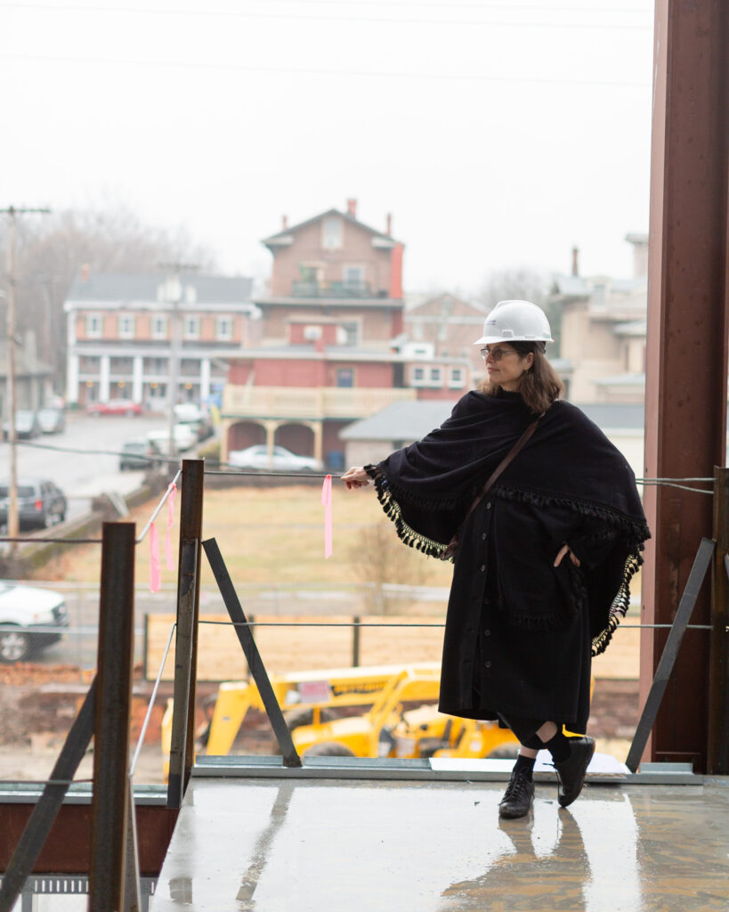 Portrait of Jill Kearny, Founder, at construction site of ArtYard, Frenchtown, NJ by Laura Billingham Photography for River Towns Magazine