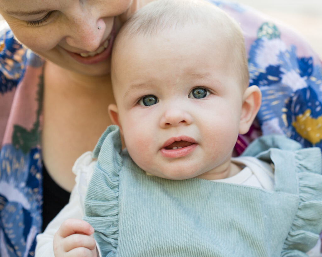 Close up portrait of a mom with an infant at Watershed Institute in Pennington, NJ by Laura Billingham Photography