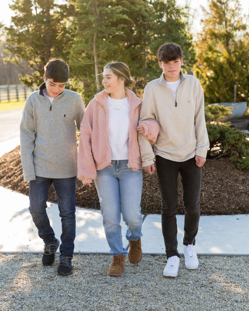 Family portrait of three teen siblings by Laura Billingham Photography at Black Shed in Stockton, NJ