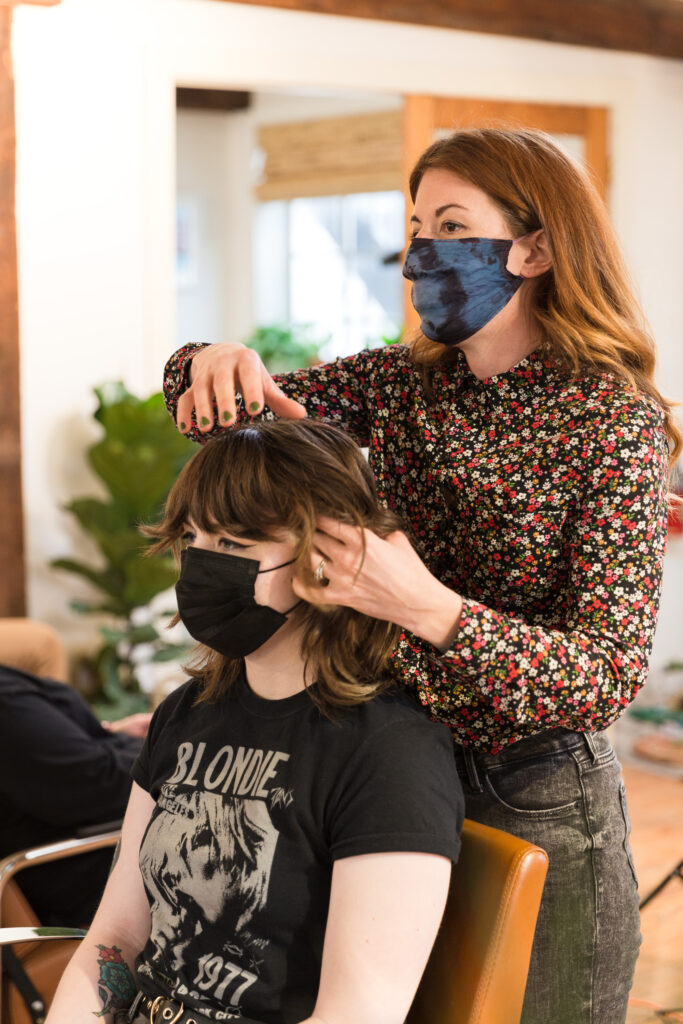 branding photography of luxury hair salon stylist at work