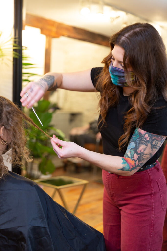 branding photography of luxury hair salon stylist at work