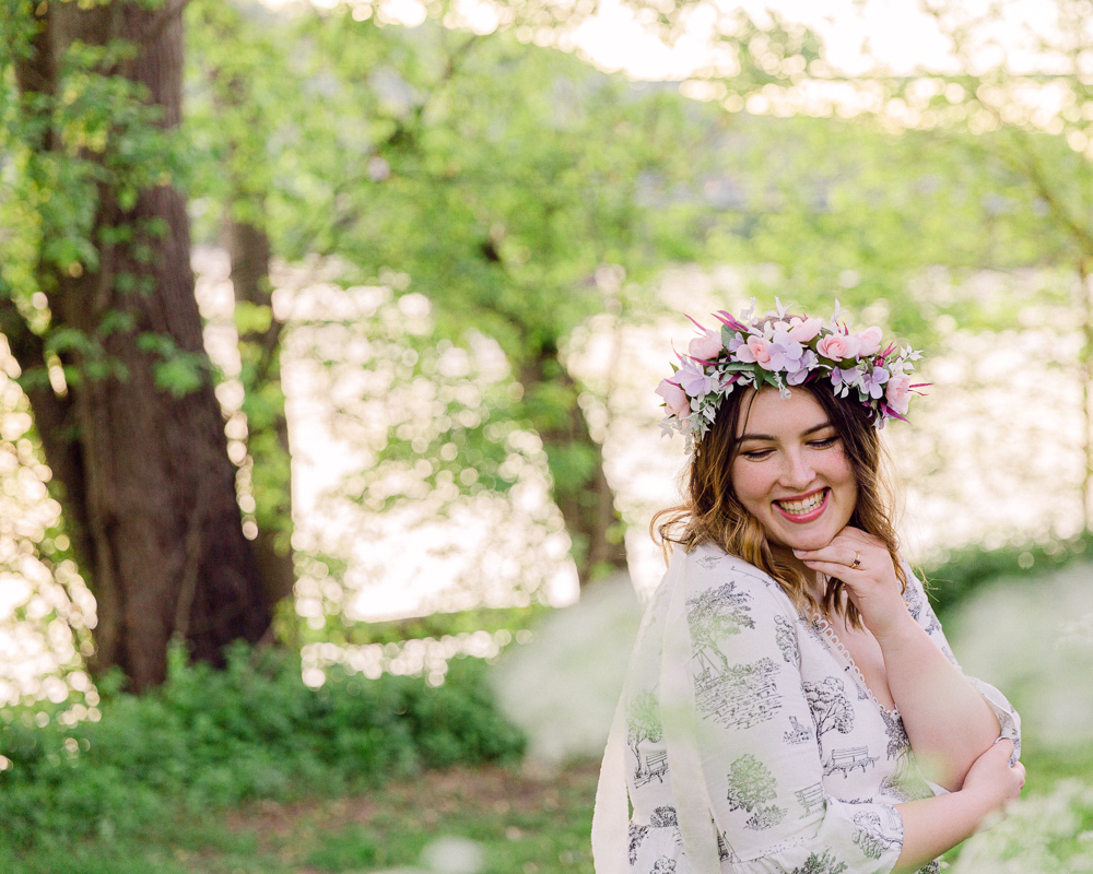 Portraits of a bohemian bride with flower crown near the Delaware River in Frenchotwn NJ