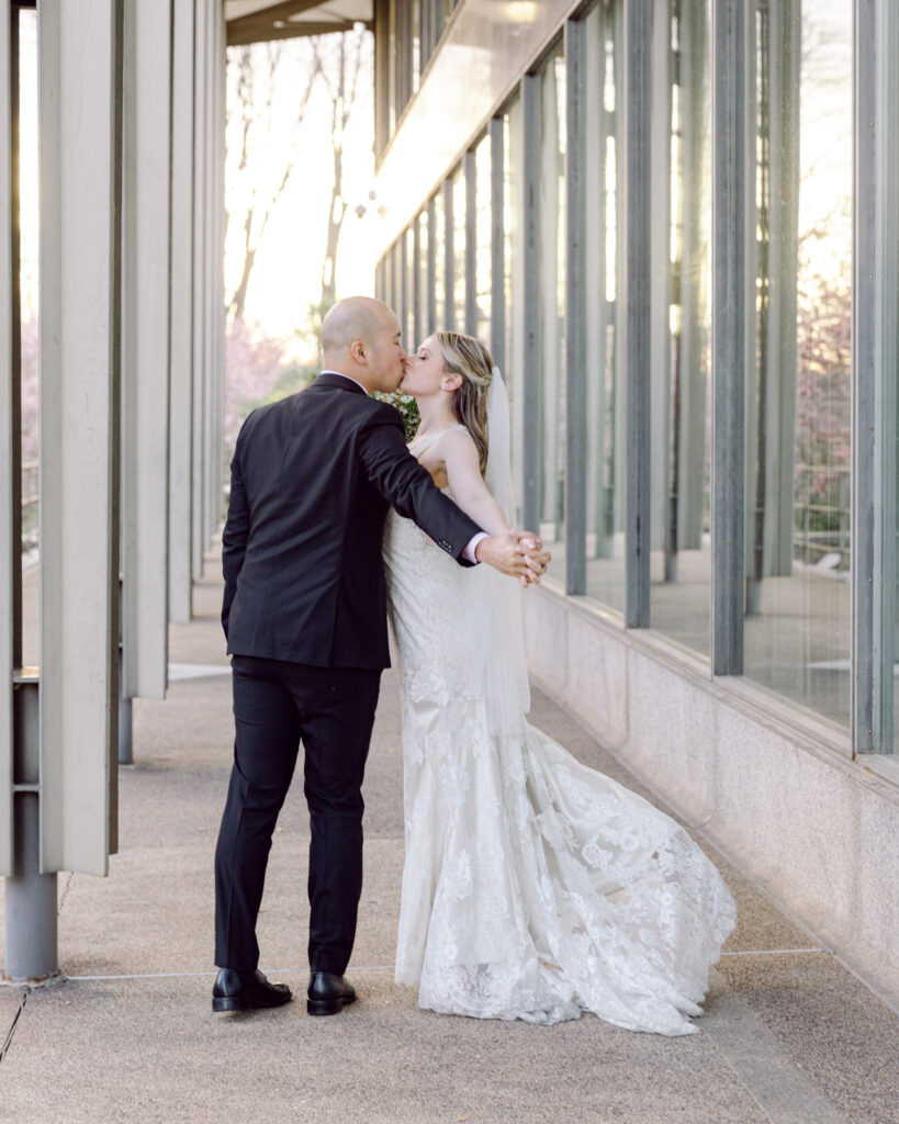 Elegant bride and groom kiss at sunset in Bethlehem, PA by Laura Billingham Photography