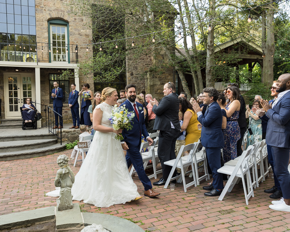 Elegant wedding ceremony in front of Old Barn at HollyHedge Estate in New Hope, PA