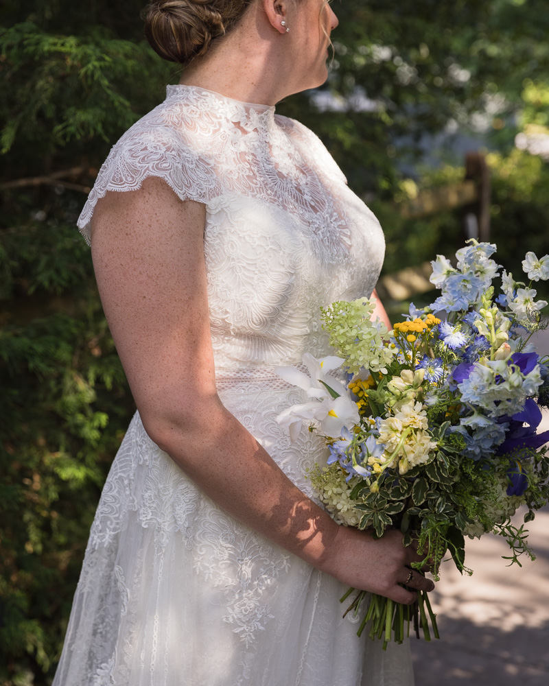 Detail of bride with big bouquet at HollyHedge Estate by Laura Billingham Photography