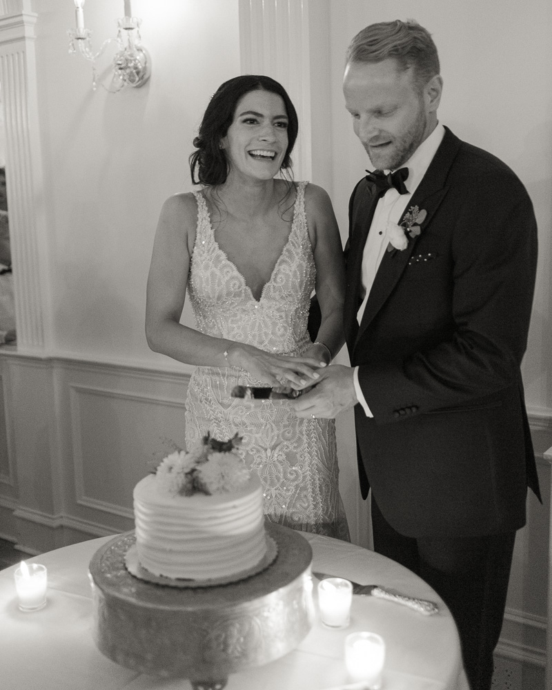 Elegant couple cut their cake at the Bernards Inn in Bernardsville, NJ
