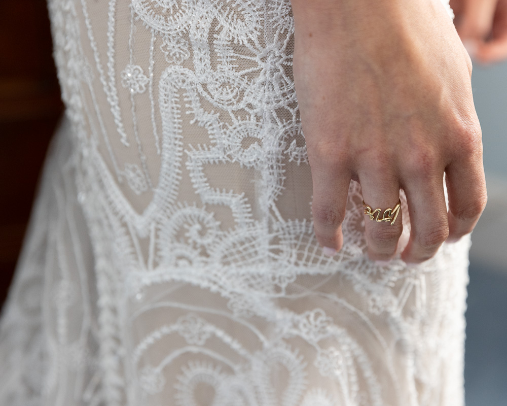 Detail of bride's Love ring by Tiffany & Co by Laura Billingham Photography