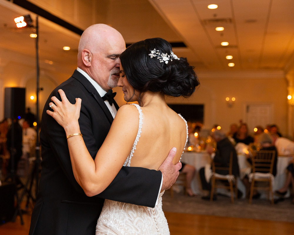Elegant bride shares dance with her father