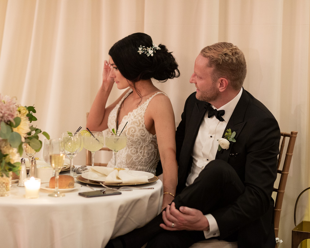 Elegant couple listens to toasts at their Bernards Inn wedding reception by Laura Billingham Photography
