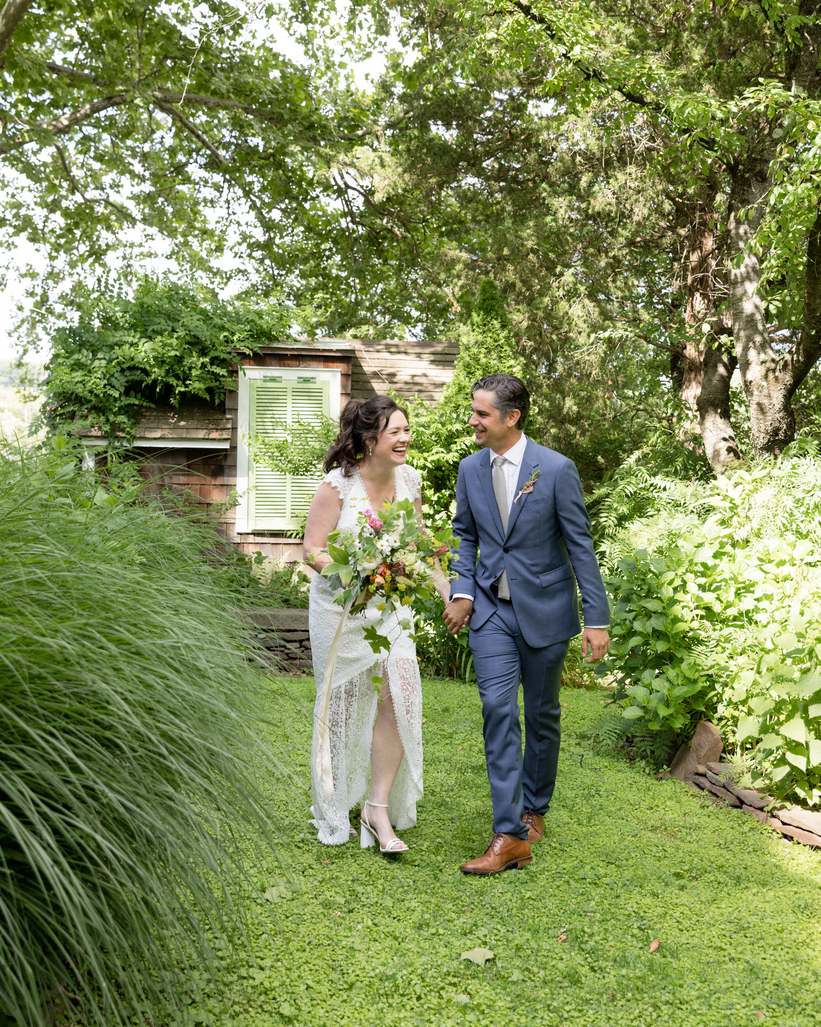Joyful couple moments after their wedding ceremony at Bridgeton House on the Delaware in Bucks County, PA