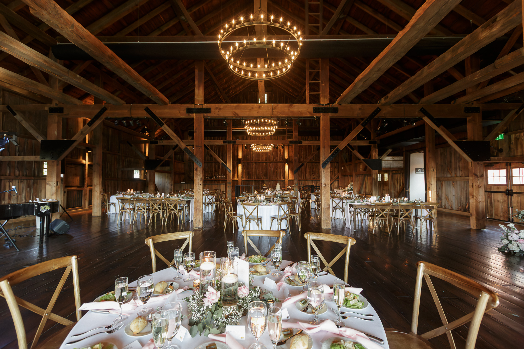 The Barn set up for a rustic elegant wedding reception at the Farm at Eagles Ridge in Lancaster, PA