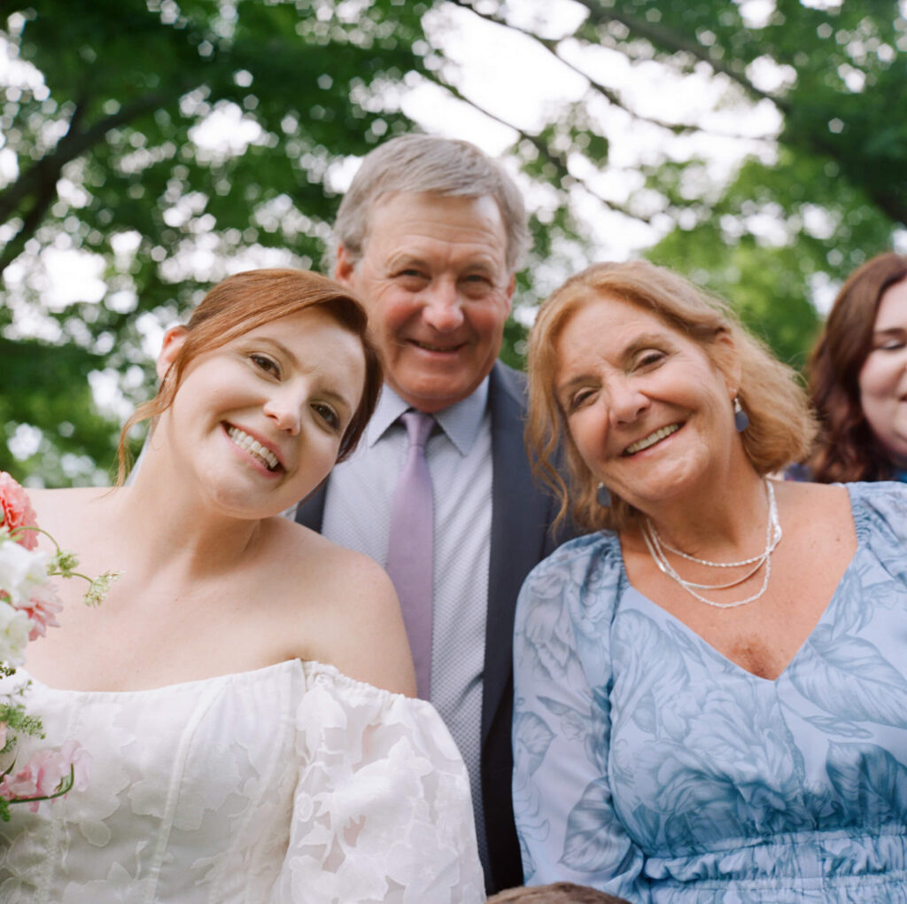 Film photograph of a bride, her dad and mom